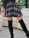 Checkered printed pleated skirt