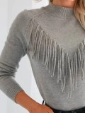 Grey fringed knitted sweater