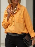 Orange button pocket shirt
