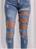 Women's ripped slim fit mid-rise jeans