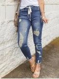 Women's vintage ripped drawstring jeans