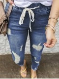 Women's vintage ripped drawstring jeans