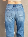 Women's washed ripped fringed jeans