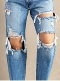 Women's washed ripped fringed jeans