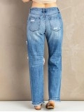 Women's washed ripped fringed jeans
